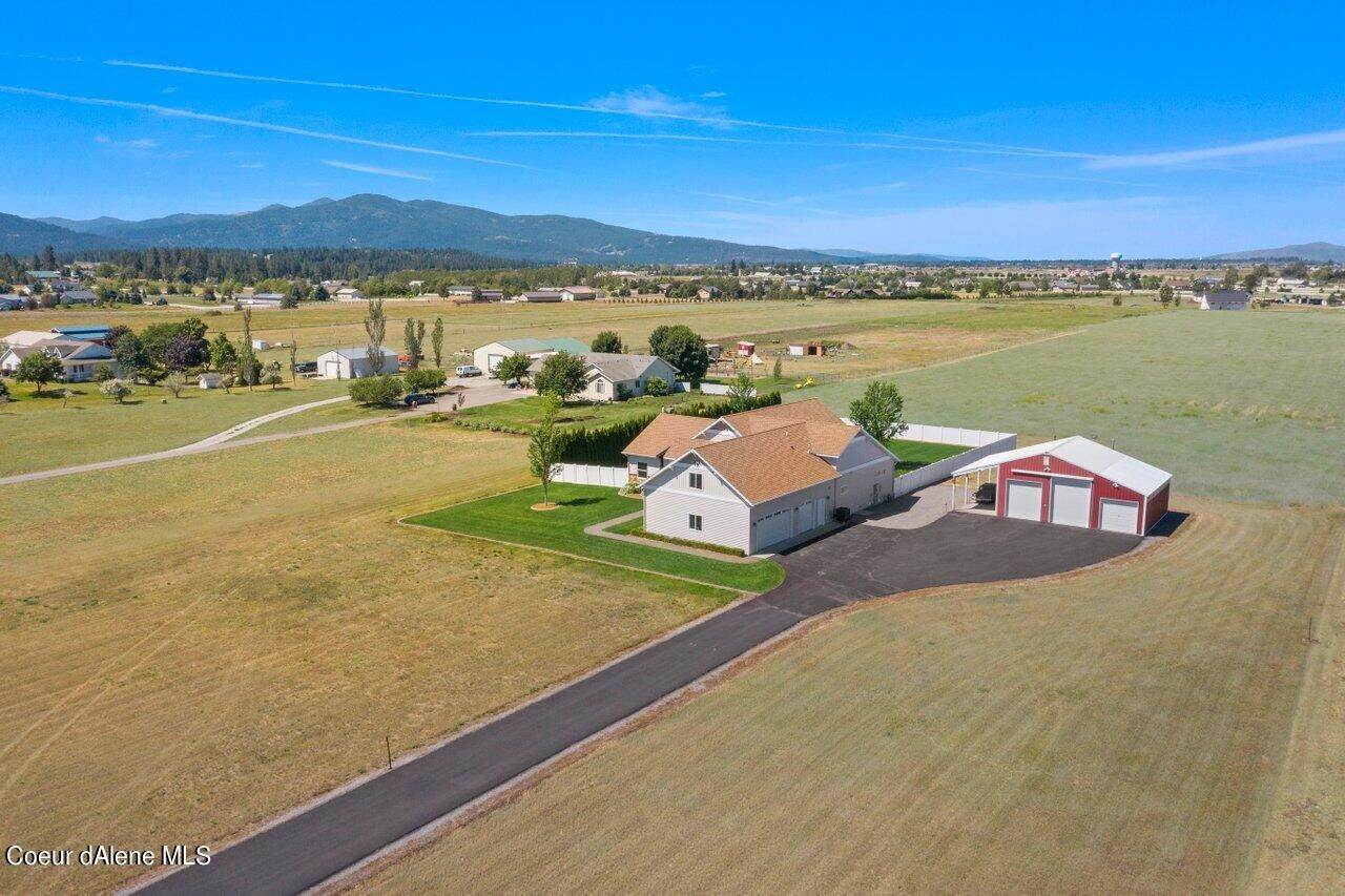 29. Single Family Homes for Sale at 7667 N HUETTER Road Post Falls, Idaho 83854 United States